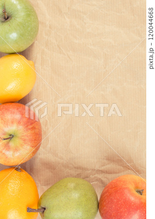 Ripe fruits on old paper. Healthy lifestyle. Fruits as source minerals and vitamins. Place for text 120044668