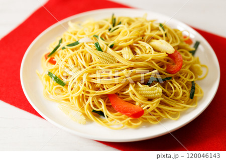 Chinese Lunar New Year concept with lucky food longevity noodles on wooden table background. Chinese Lunar New Year concept with lucky food longevity noodles on wooden table background. 120046143