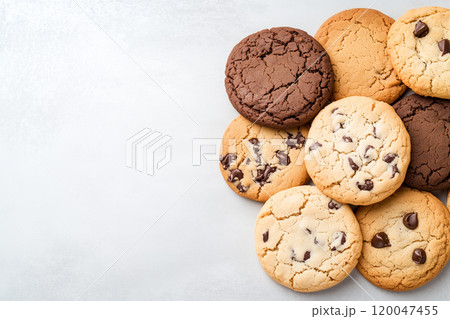 Top view of chocolate chip cookies on a solid background. 120047455
