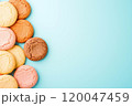 Mixed-flavor cookies on a pastel background with a copy space.  120047459