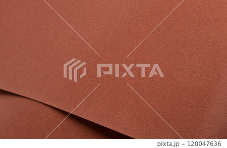 Abstract designer paper background with a velvety, warm matte texture in rich earthy tones. 120047636
