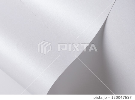 Glossy designer paper background with a pearl white gradient, featuring a chic, wavy texture and 120047657