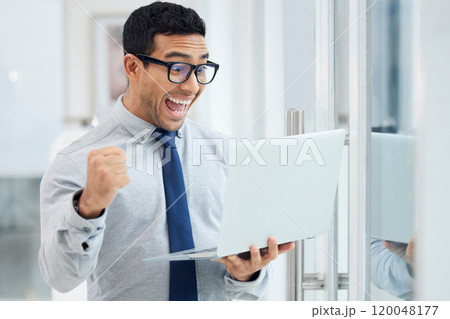 Happy man, laptop and promotion with good news for winning, deal or online offer at office. Excited businessman, employee and smile with computer for achievement, victory or celebration at workplace Happy man, laptop and promotion with good news for winning, deal or online offer at office. Excited businessman, employee and smile with computer for achievement, victory or celebration at workplace 120048177