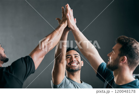 High five, group and men in gym for fitness, training or workout class for wellness success. Happy, sports and team of athletes with hands together for exercise victory, collaboration or goals. 120048178