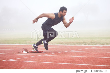 Outdoor, sports and man running at track for fitness, exercise and training for competition. Fog, mist and Asian male athlete with speed at athletics field for cardio, workout and practice for race Outdoor, sports and man running at track for fitness, exercise and training for competition. Fog, mist and Asian male athlete with speed at athletics field for cardio, workout and practice for race 120048206