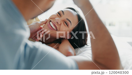 Couple, relax and touch face on bed for love, romance and funny storytelling in home. Man, woman or happy in bedroom with trust, commitment and enjoy weekend sleep in with fun, joke and good memories Couple, relax and touch face on bed for love, romance and funny storytelling in home. Man, woman or happy in bedroom with trust, commitment and enjoy weekend sleep in with fun, joke and good memories 120048300