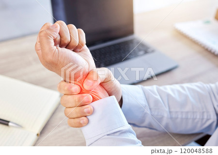 Arthritis, injury or wrist pain with business man at desk in office with laptop and glowing overlay. Accident, anatomy and burnout with red highlight on arm of employee in workplace for strain 120048588