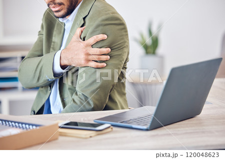 Business, man and shoulder pain from injury in office with muscle tension, arm strain and laptop at workplace. Professional, employee and hands with inflammation, accident and discomfort at workspace 120048623