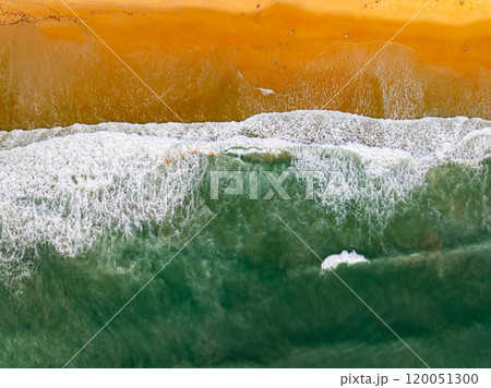 Top view sea surface waves crashing in summer season seascape background,Nature sea beach background,High angle view amazing waves,Wide angle image beach background 120051300