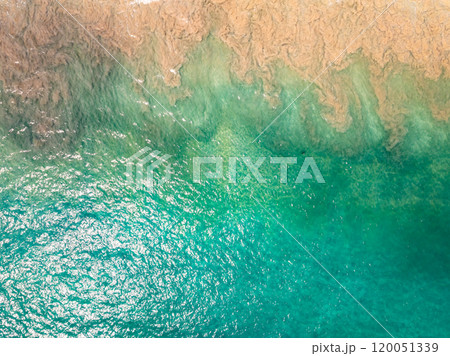 Top view sea surface waves crashing in summer season seascape background,Nature sea beach background,High angle view amazing waves,Wide angle image beach background 120051339