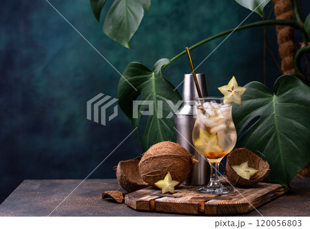 Summer Tropical cocktail with carambola Summer Tropical cocktail with carambola 120056803