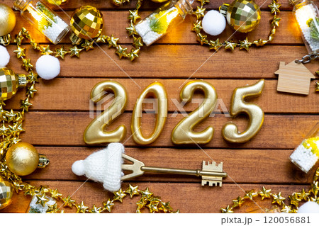 Golden figures number 2025 and tiny home on background of cozy windows of a house with warm light with festive decor of stars,snow and garlands. Greeting card, Happy New Year, cozy home Golden figures number 2025 and tiny home on background of cozy windows of a house with warm light with festive decor of stars,snow and garlands. Greeting card, Happy New Year, cozy home 120056881