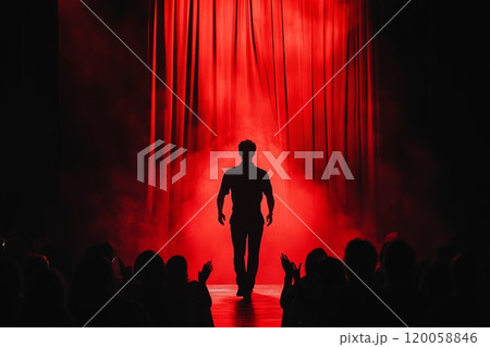 silhouette of a man from the back coming out from behind the scenes onto the stage silhouette of a man from the back coming out from behind the scenes onto the stage 120058846