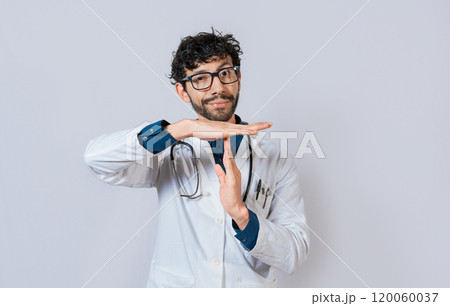 Male doctor gesturing time out. Doctor making time out gesture with palms on isolated background Male doctor gesturing time out. Doctor making time out gesture with palms on isolated background 120060037