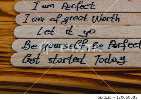 Positive thoughts to increase self esteem on wooden sticks 120060688