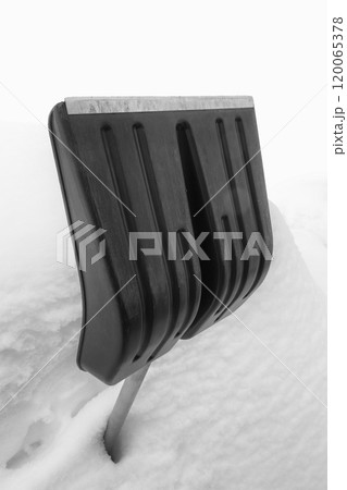 A shovel in a snowdrift A shovel in a snowdrift 120065378