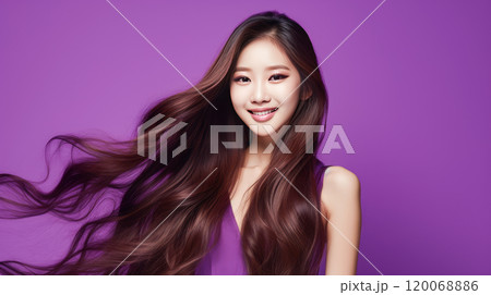 Portrait of smiling asian teenager girl purple background. 120068886