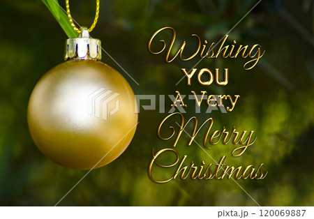 Golden Merry Christmas and Happy New Year wishes with Christmas ball background. Christmas celebration concept Golden Merry Christmas and Happy New Year wishes with Christmas ball background. Christmas celebration concept 120069887