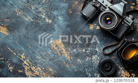 old style photo camera on abstract grey backgound, retro fashion photography concept, view from abobe, copy space old style photo camera on abstract grey backgound, retro fashion photography concept, view from abobe, copy space 120070318