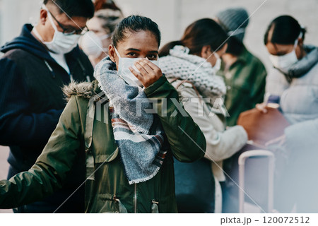 Coronavirus has gotten out of control. Shot of a group of young people wearing masks while travelling in a foreign city. Coronavirus has gotten out of control. Shot of a group of young people wearing masks while travelling in a foreign city. 120072512