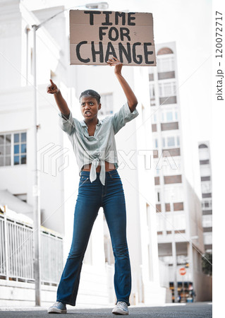 Feminism is for everybody. Shot of a young woman protesting in the city. Feminism is for everybody. Shot of a young woman protesting in the city. 120072717