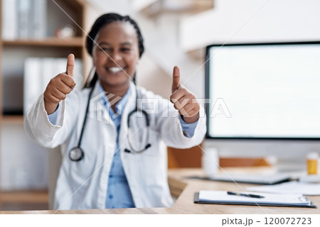 Big or small, I know Ill make a difference. Portrait of a young doctor showing thumbs up in her office. 120072723