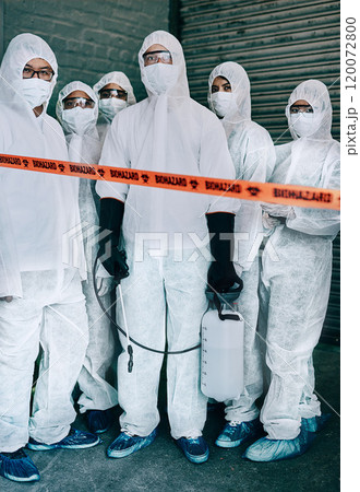The virus fighting squad. Shot of a group of healthcare workers wearing hazmat suits working together to control an outbreak. The virus fighting squad. Shot of a group of healthcare workers wearing hazmat suits working together to control an outbreak. 120072800