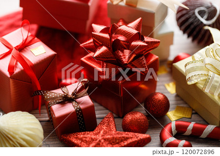 assorted gift boxes on wooden background assorted gift boxes on wooden background 120072896