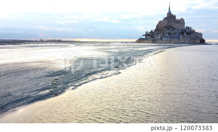 Mont Saint Michel at Low Tide with Scenic Landscape 120073383