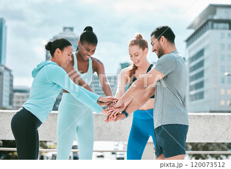 Fitness, group and hands together outdoor in city with exercise, motivation and support. Runner, team and happy people with marathon training, diversity and smile of urban running club or friends 120073512