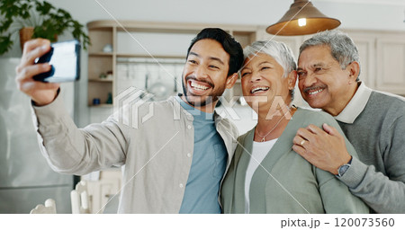 Home, parents or adult son with selfie for happy memory, social media post or profile picture update. Photography, people and family with weekend visit, bonding or relax with embrace or love in house Home, parents or adult son with selfie for happy memory, social media post or profile picture update. Photography, people and family with weekend visit, bonding or relax with embrace or love in house 120073560