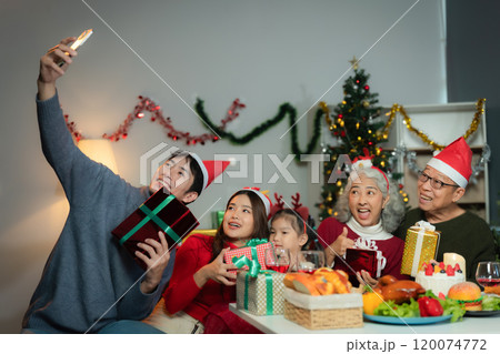 Dinner and Family holiday celebrating, together at Merry Christmas and  New Year. 120074772