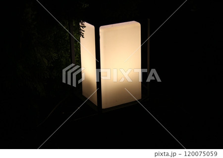 light lamp on dark background 120075059