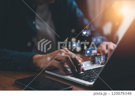 Man using laptop with social media notifications internet online and digital marketing technology concept. 120076346