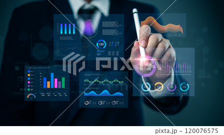 Business professional using a digital pen to interact with a virtual analytics dashboard displaying various charts and graphs. 120076575