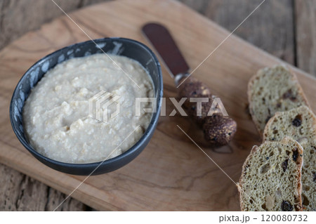 bread slices and dip sauce as appetizer on table bread slices and dip sauce as appetizer on table 120080732