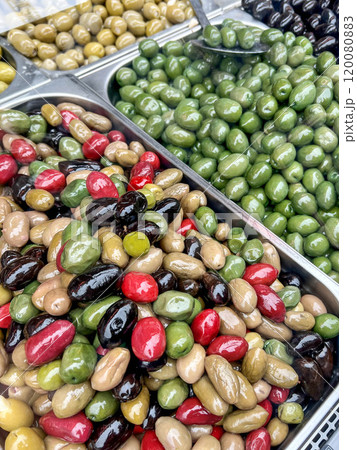 colorful pickled olive fruits at market 120080883