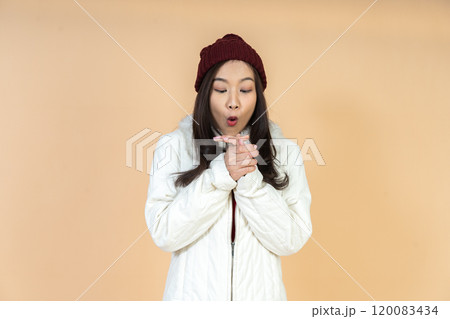 Cheerful Winter Fashion Portrait with Natural Expression Showing Cozy Warmth in Contemporary Studio Setting Ideal for Cold Season Campaign Cheerful Winter Fashion Portrait with Natural Expression Showing Cozy Warmth in Contemporary Studio Setting Ideal for Cold Season Campaign 120083434