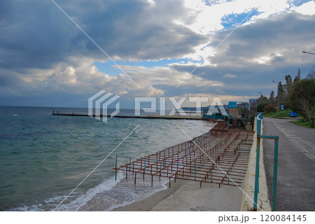 Consequences of commercial activity on the city beaches of Odessa. There is a commercial cafe located right on the public sandy beach. During winter storms, the sea is littered with metal. Consequences of commercial activity on the city beaches of Odessa. There is a commercial cafe located right on the public sandy beach. During winter storms, the sea is littered with metal. 120084145