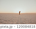 pink Lemurian lake, romantic photoshoot of young couple in love 120084818