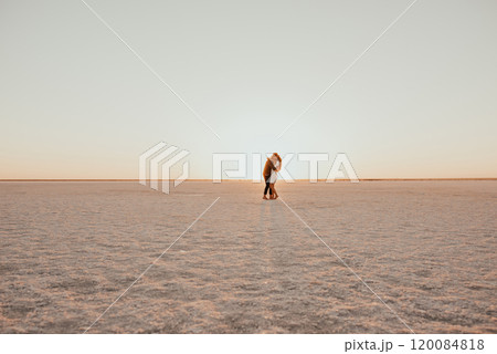 pink Lemurian lake, romantic photoshoot of young couple in love 120084818