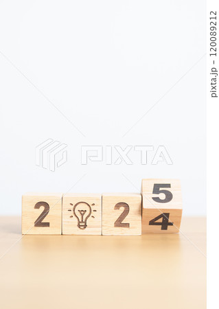2024 year change to 2025 year block with lightbulb. Business Idea, Creative, Thinking, brainstorm, Goal, Resolution, strategy, plan, Action, change and New Year start concepts 2024 year change to 2025 year block with lightbulb. Business Idea, Creative, Thinking, brainstorm, Goal, Resolution, strategy, plan, Action, change and New Year start concepts 120089212