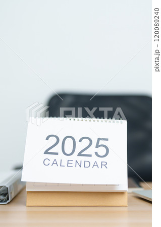 2025 Year Calendar on table with laptop computer during working and writing in office. countdown, Happy New Year, Resolution, Year End and New Start and Goals Plan Action Concept 2025 Year Calendar on table with laptop computer during working and writing in office. countdown, Happy New Year, Resolution, Year End and New Start and Goals Plan Action Concept 120089240