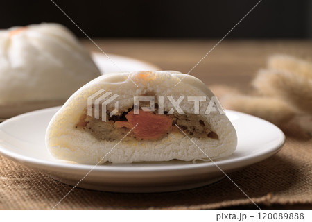 Asian steamed bun stuffed with pork and egg Asian steamed bun stuffed with pork and egg 120089888