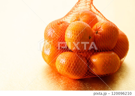 Tangerine oranges on golden background for celebration Lunar New Year 120096210