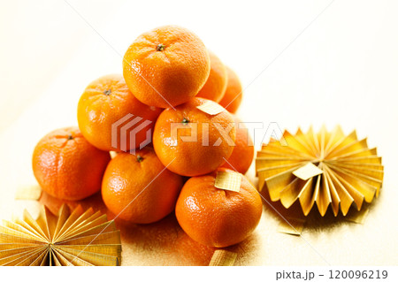 Tangerine oranges on golden background for celebration Lunar New Year 120096219