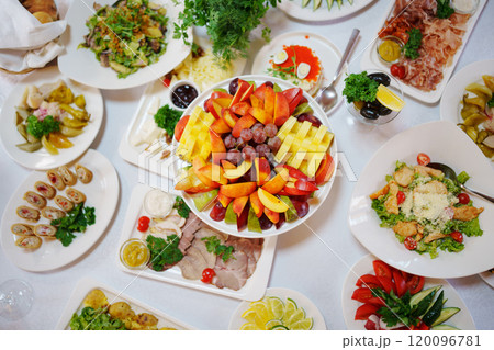 A banquet table served for a big holiday. A banquet table served for a big holiday. 120096781