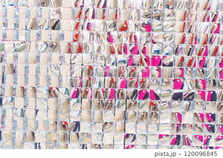 A wall with silver sequins to decorate the interior.  120096845