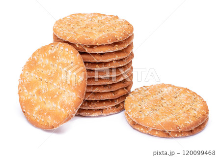 A Stack of Round Salt Crackers with Sesame Isolated on White Background 120099468