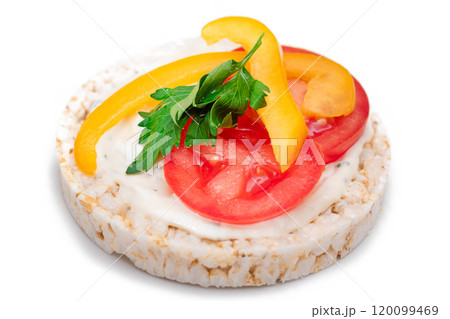 Vegan Rice Cake Sandwich with Fresh Tomato, Yellow Paprika and Greens - Isolated Vegan Rice Cake Sandwich with Fresh Tomato, Yellow Paprika and Greens - Isolated 120099469